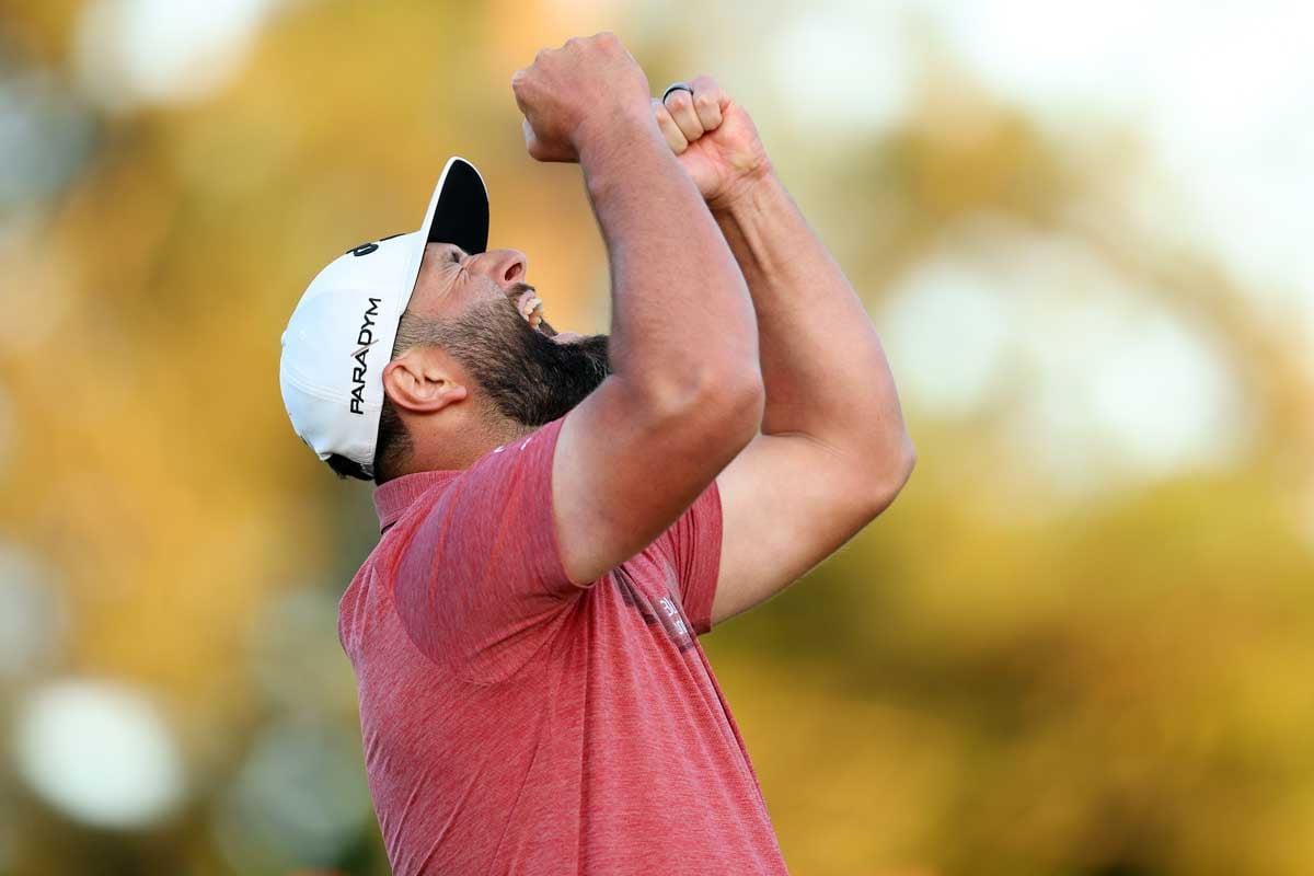 優勝を決め、両手を突き上げて喜びを表現したジョン・ラーム 写真:Getty Images