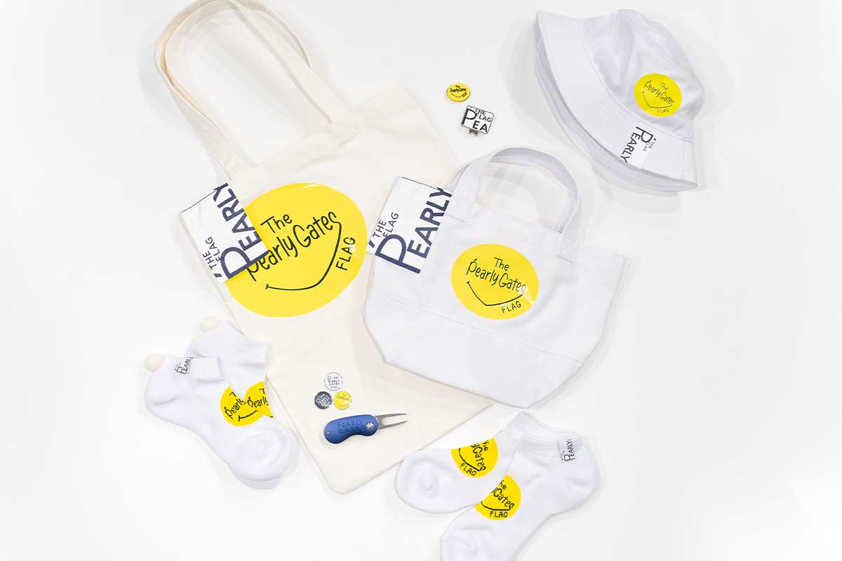 「PGスマイル」が変化したキャッチーなショップアイコンをモチーフにした店舗限定アイテム